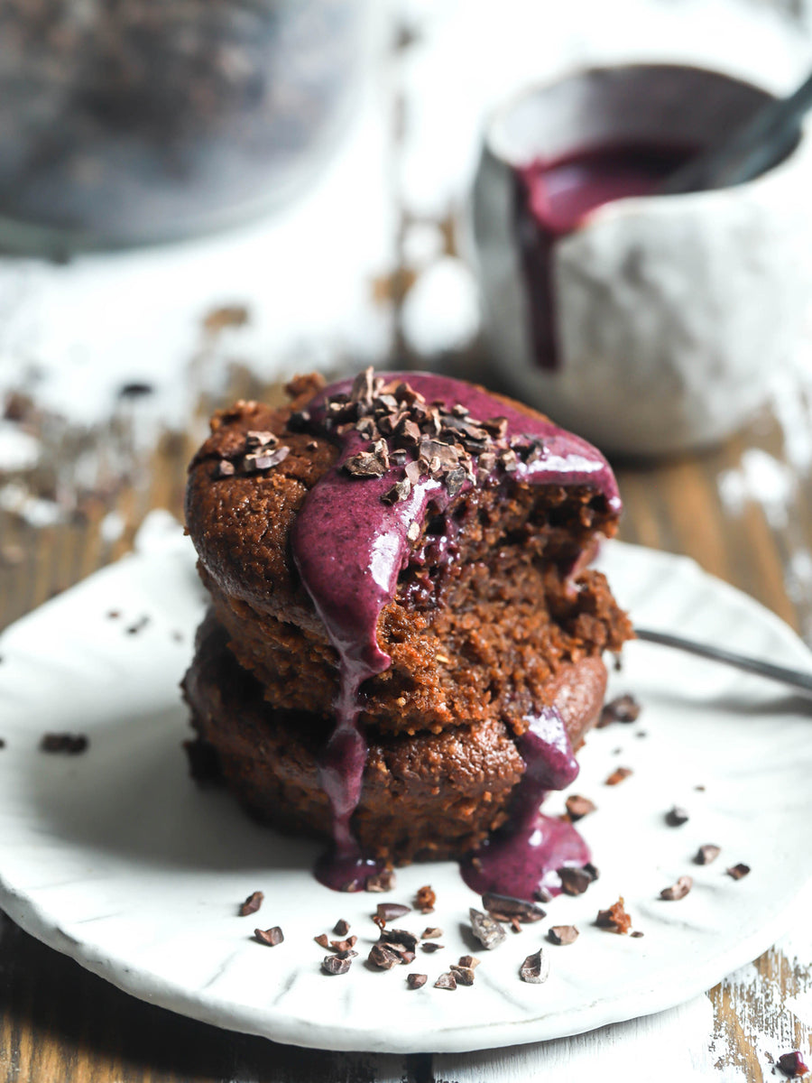 Vegan chocolate cakes with coconut berry sauce