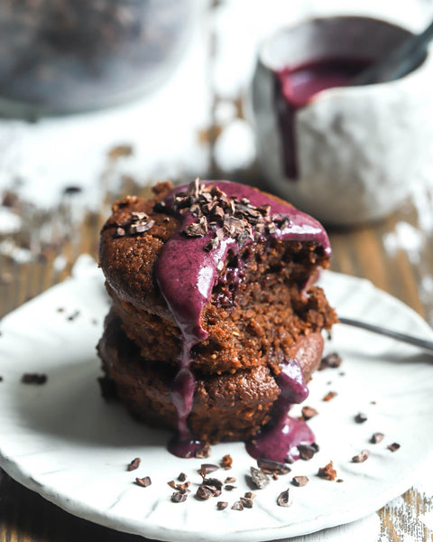 Vegan chocolate cakes with coconut berry sauce